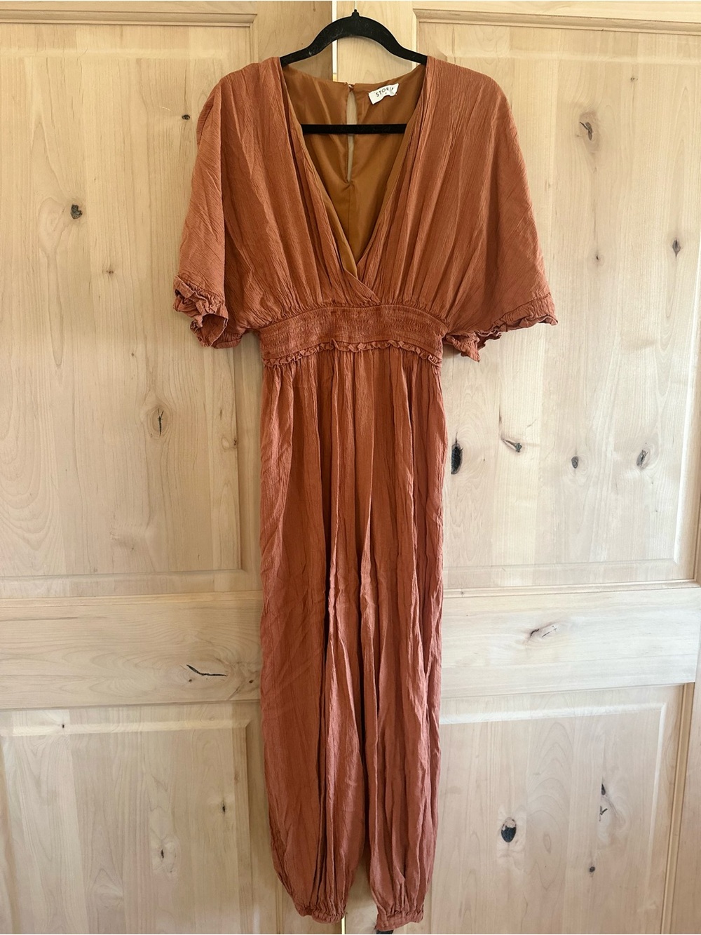 Storia Rust V-Neck Smocked Waist Jumpsuit